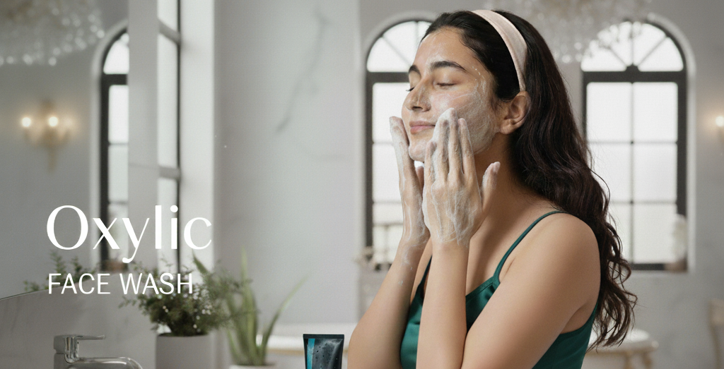 Woman applying face wash in a bathroom with Oxylic Face Wash product displayed.